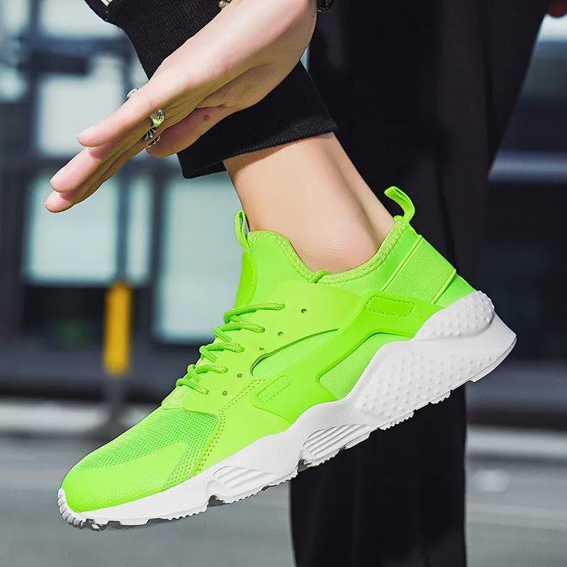 Men's low-top casual lace-up trainers in fluorescent colours with mesh upper and cross shoulder strap