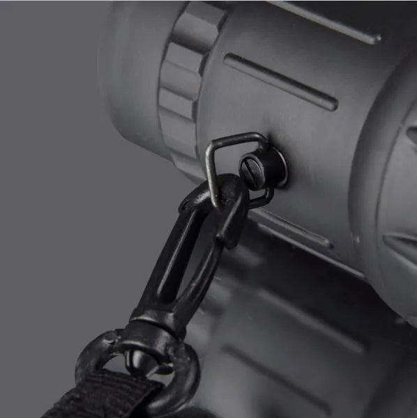 Black 16x52 high-power monocular telescope with 52mm lens and HD green film coating.