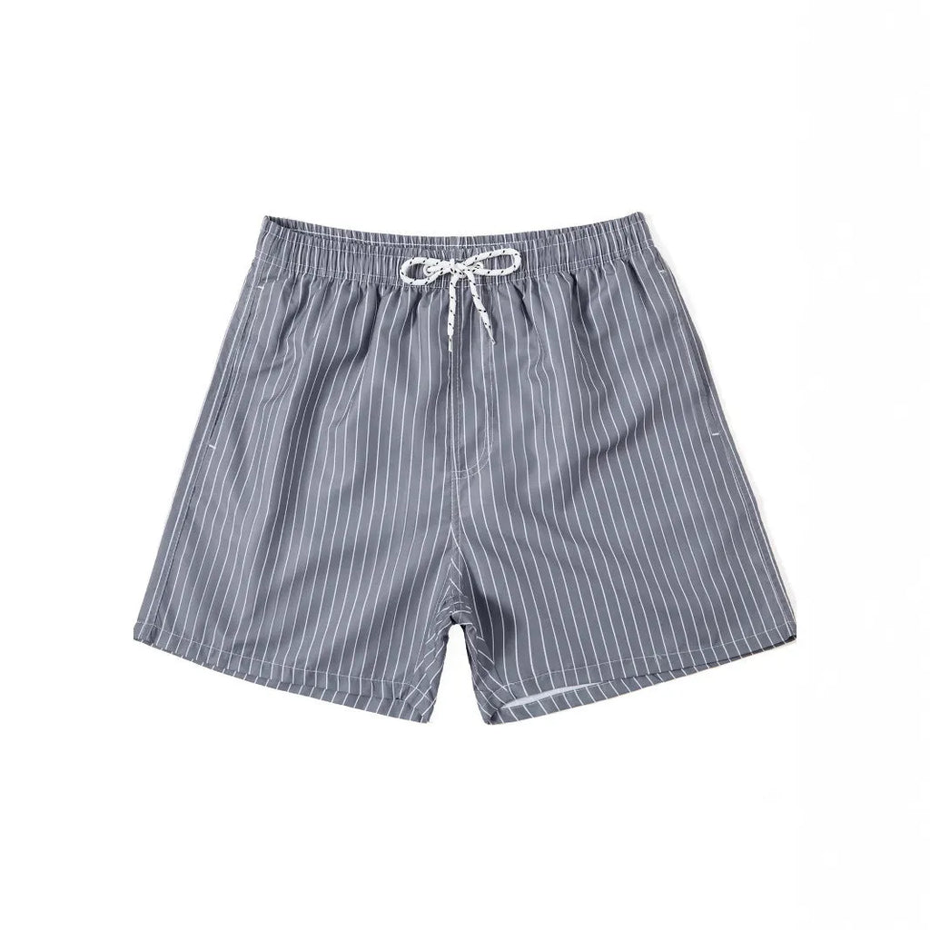 Striped triangle lining beach shorts in navy blue, grey, khaki and light blue colours with straight leg opening
