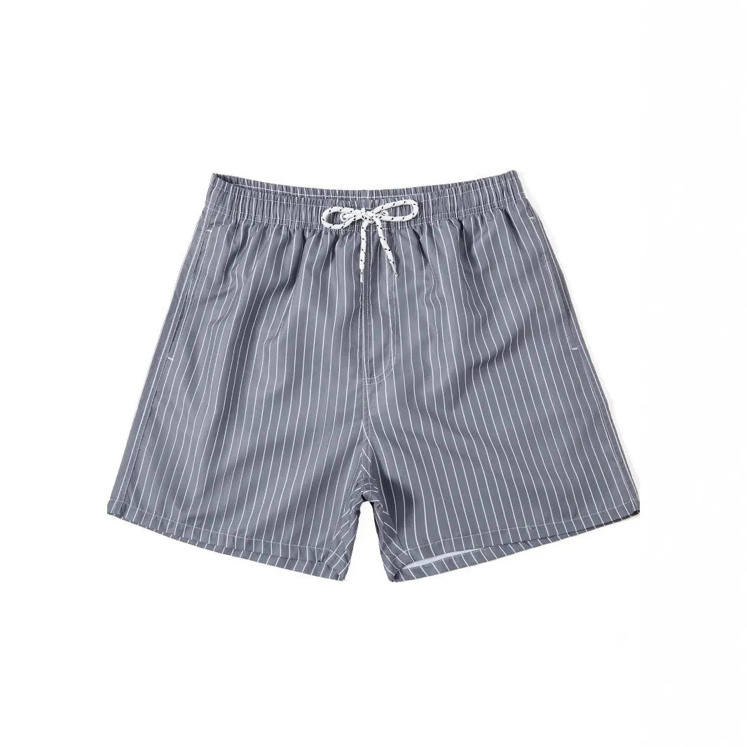 Striped triangle lining beach shorts in navy blue, grey, khaki and light blue colours with straight leg opening