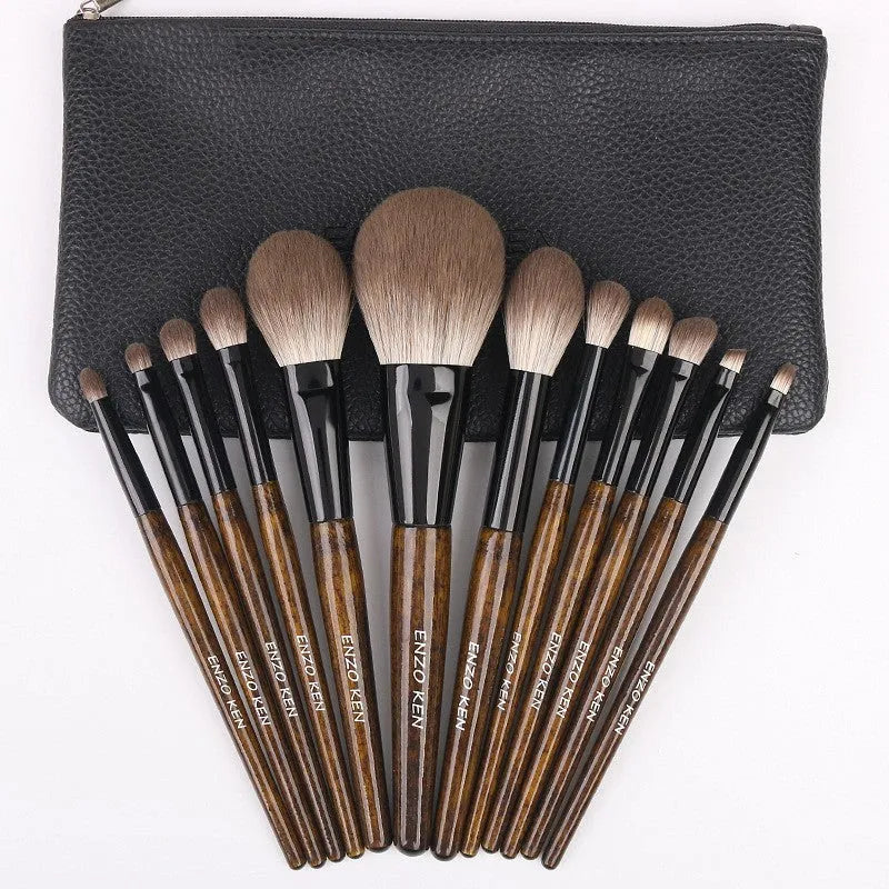 12-piece makeup brush set with wooden handles in black PU roll-up case
