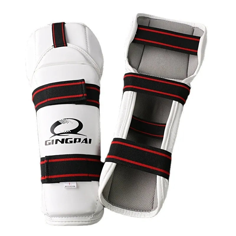 Taekwondo leg and arm protective gear set showing arm guards, leg protectors, and elbow guards