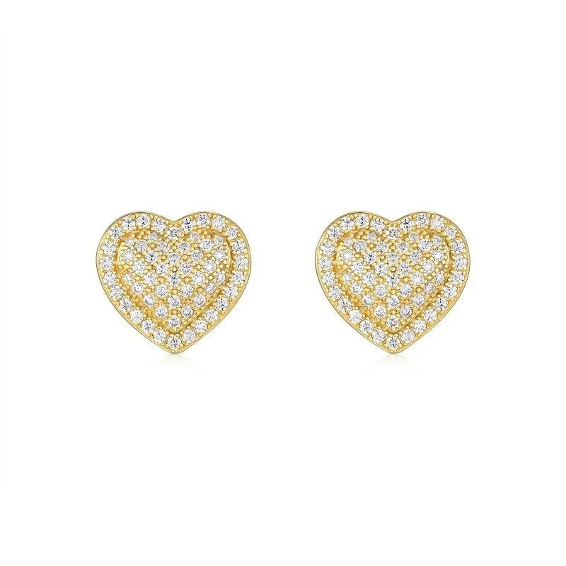 A pair of gold-toned heart-shaped stud earrings with a moissanite stone, made from S925 silver.
