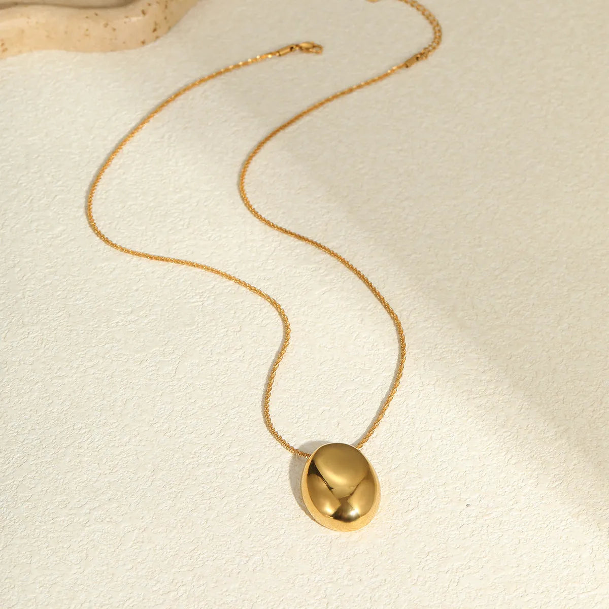 Gold geometric pendant necklace with adjustable 41-50cm chain on stainless steel with 18K gold-plating