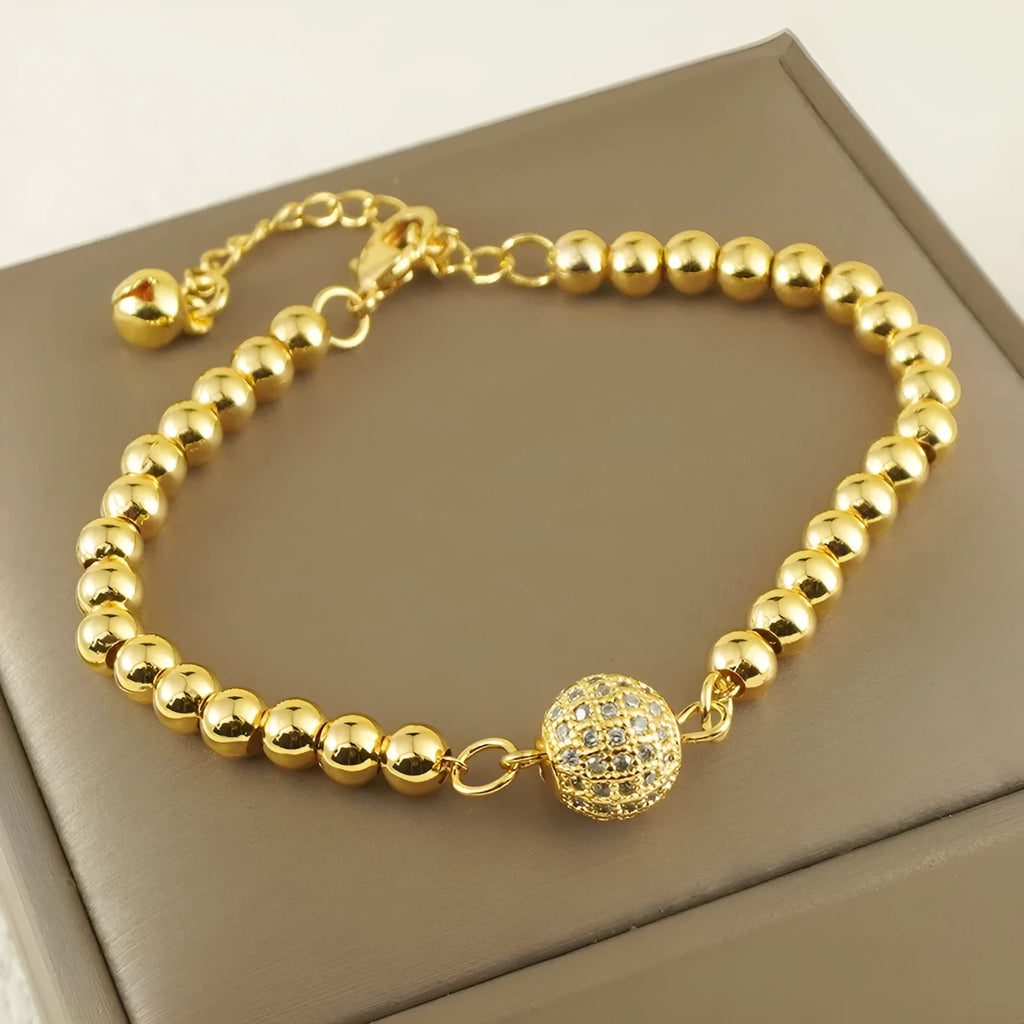 Women's heart-shaped copper bracelet with zircon stones in an Arabic style design.