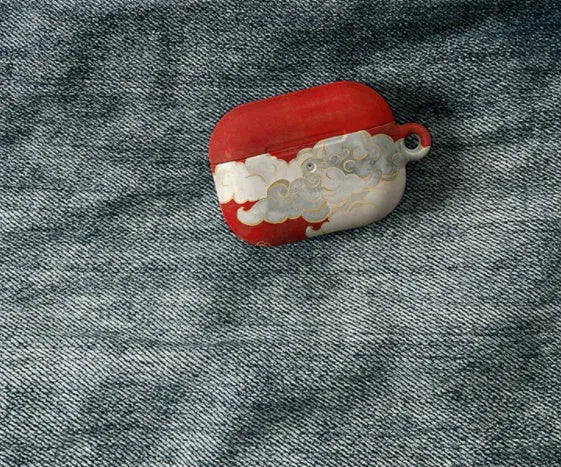 Red Chinese style cloud hard plastic protective cover for Apple AirPods case on white background