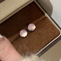 Round egg surface chalcedony earrings with four-claw setting in Chinese national fashion retro style