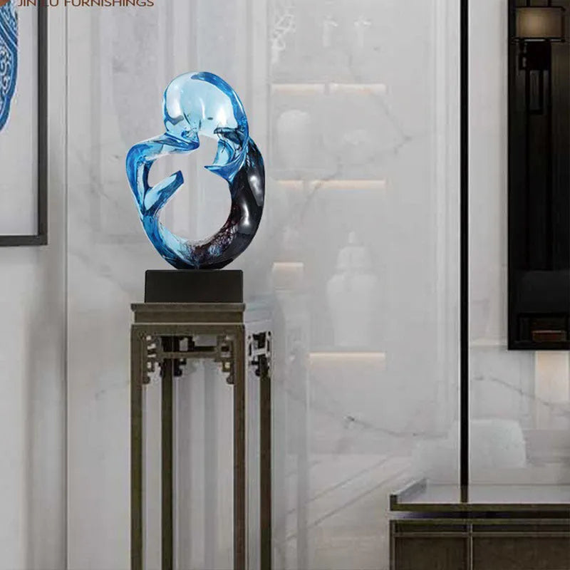 Transparent resin sculpture ornament in modern simplicity style showing orange red or blue colour options
