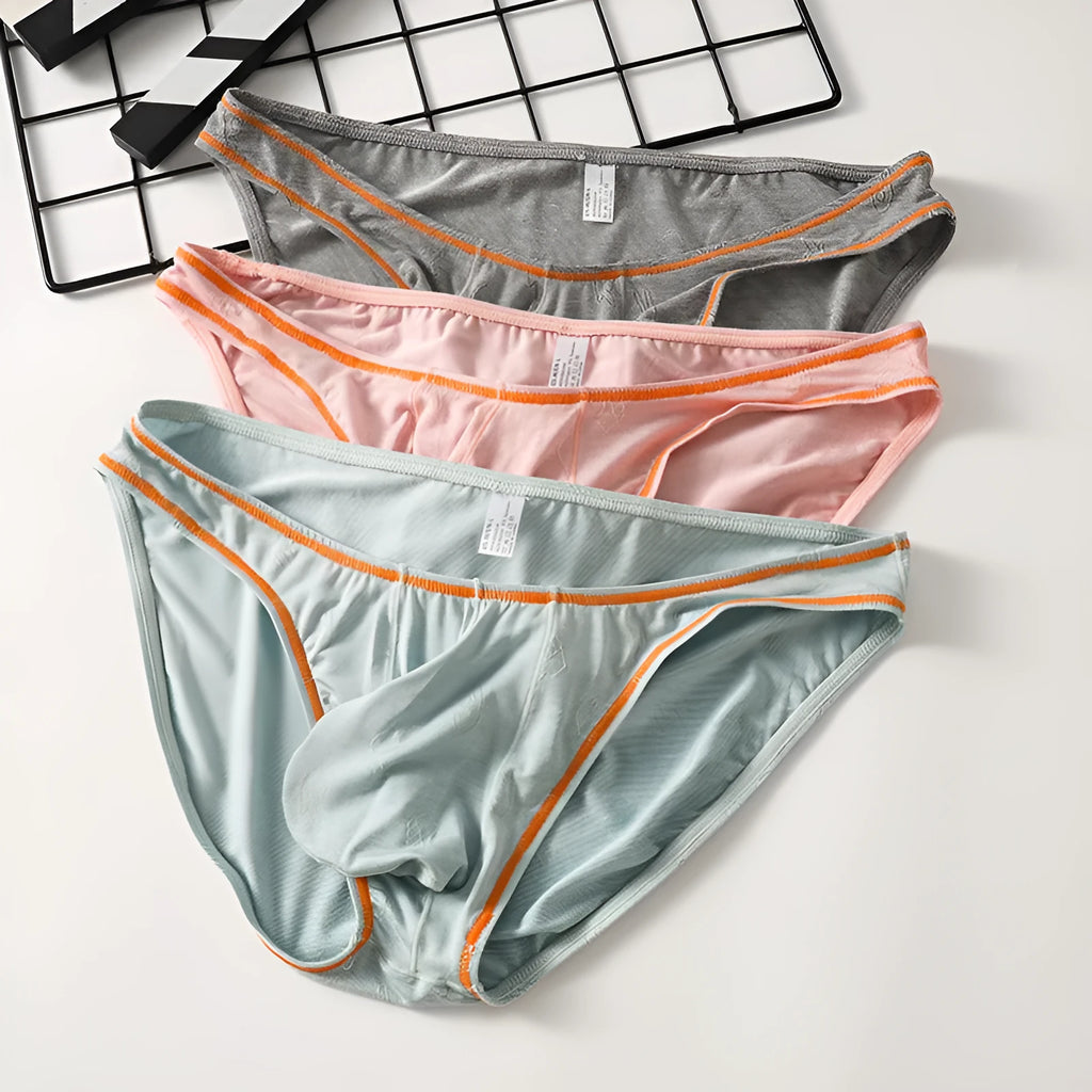 Men's modal fabric underwear with butt-lift design in dark grey, shown flat.