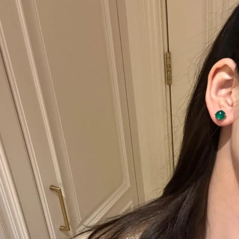 Round egg surface chalcedony earrings with four-claw setting in Chinese national fashion retro style