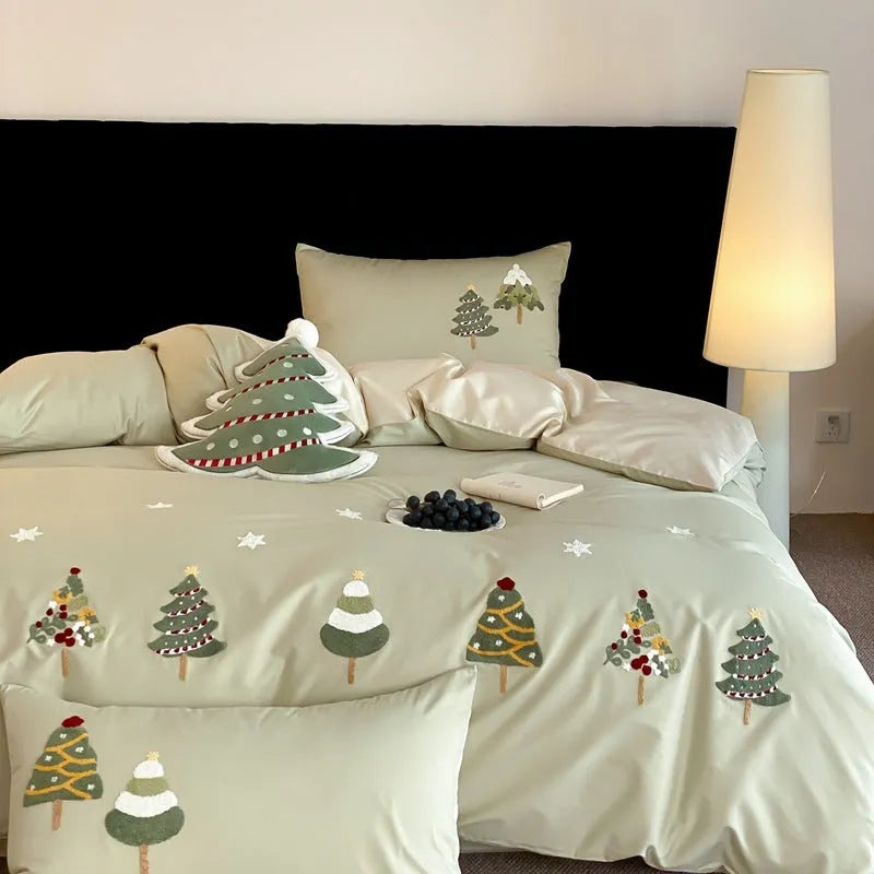 Pure cotton four-piece bedding set with embroidered Christmas tree and towel pattern in cream blue or green.