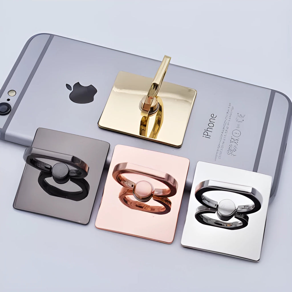 Metal ring phone bracket stand with 360° rotation, black colour, attached to smartphone on desktop