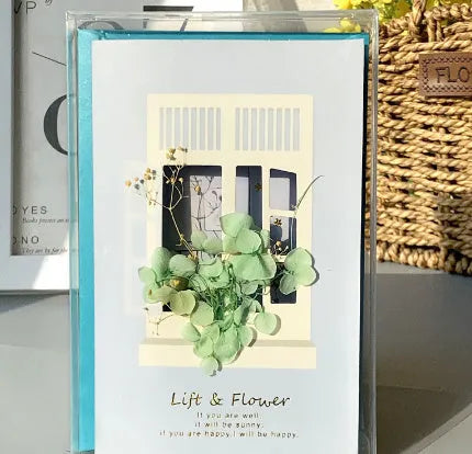 Handmade 3D boxed greeting card with butterfly shape, hot stamping, and artificial flowers on coated paper.