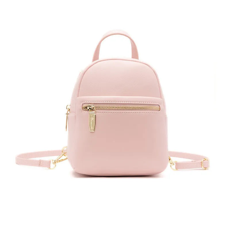 Soft PU mini backpack in street style, shown in one of six colours with contrast details and external 3D pocket.