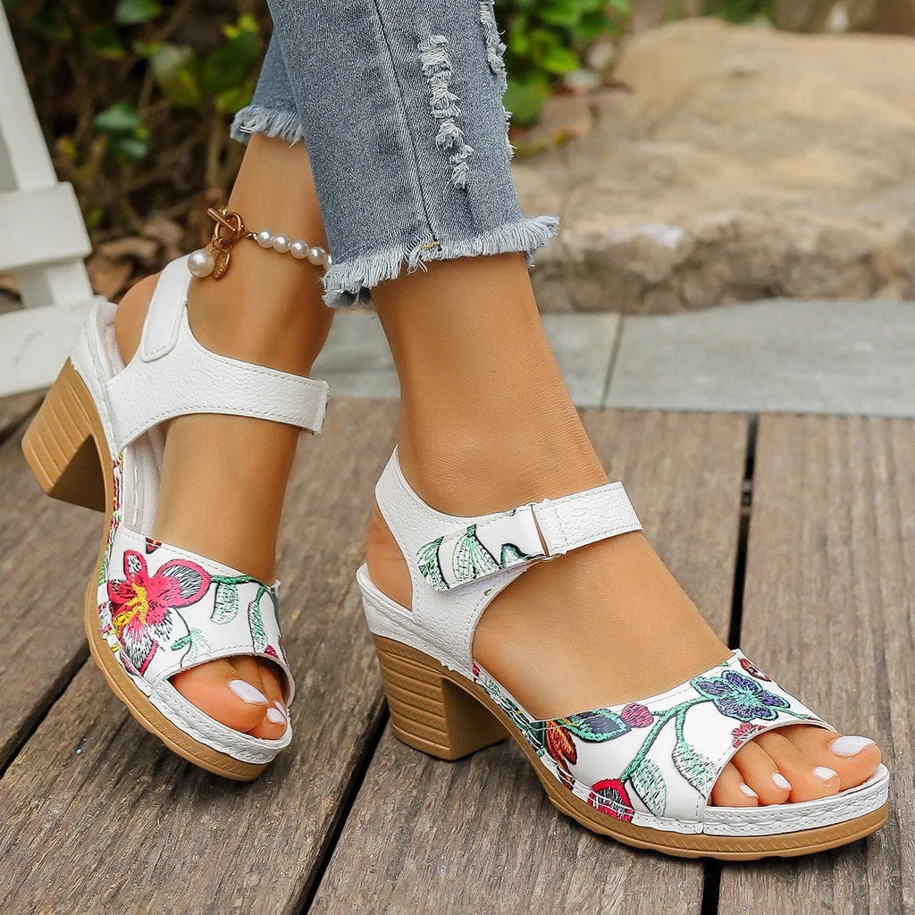 White women's high heel sandals with Velcro buckle fastening on rubber sole