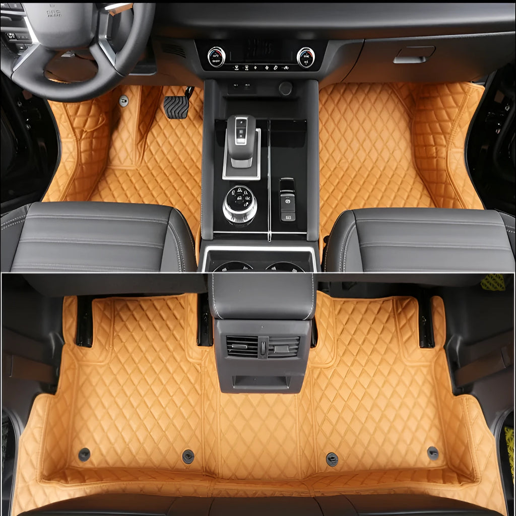 Custom black floor mats fitted in a 2023 Mitsubishi Outlander footwell