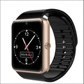 Black smart watch with 1.54 inch display and black silicone strap on a wrist