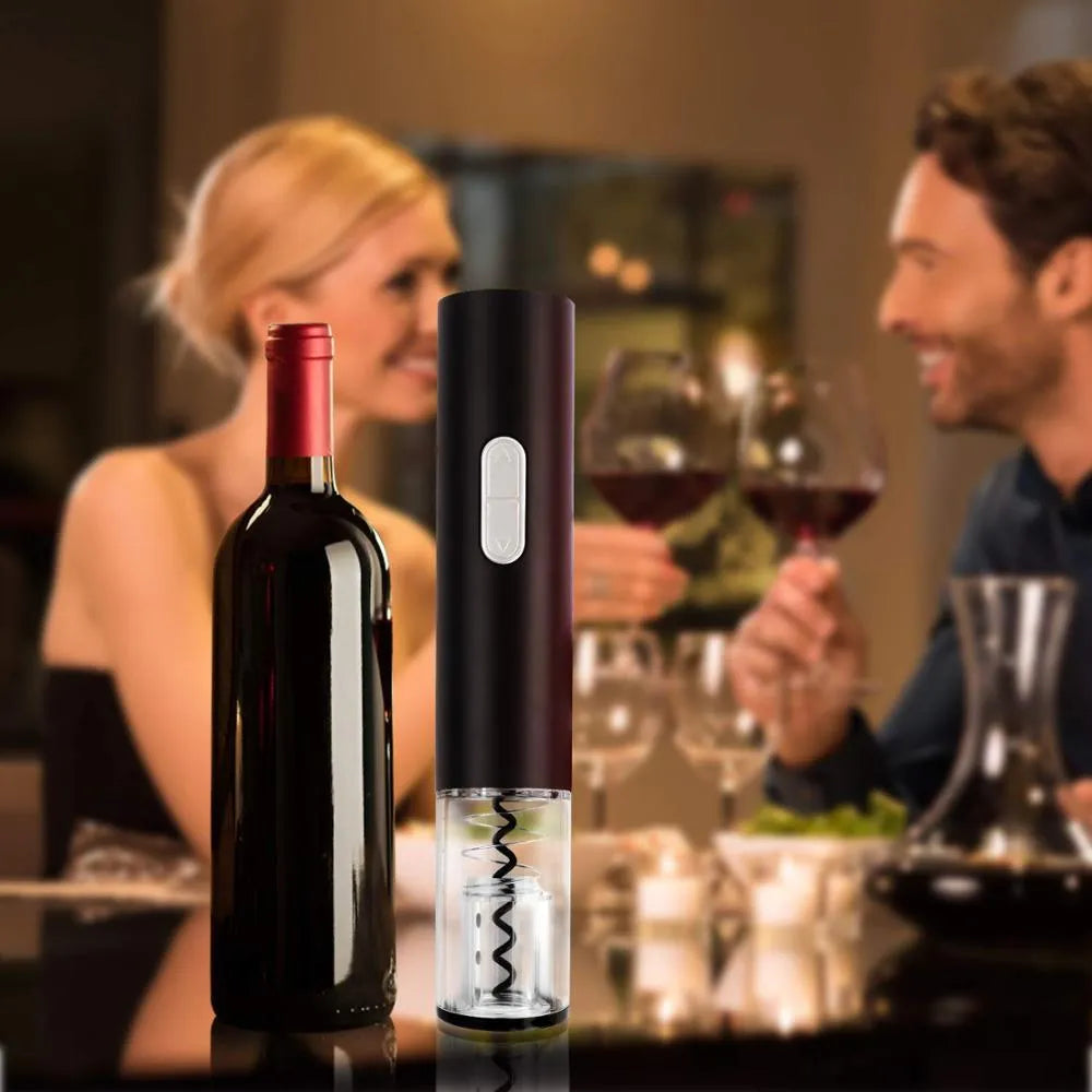 Black automatic electric wine bottle opener with integrated foil cutter on a kitchen counter.