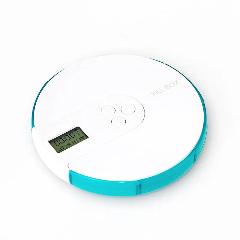 Blue 7-compartment alarm clock pill dispenser showing digital display and separate pill slots.