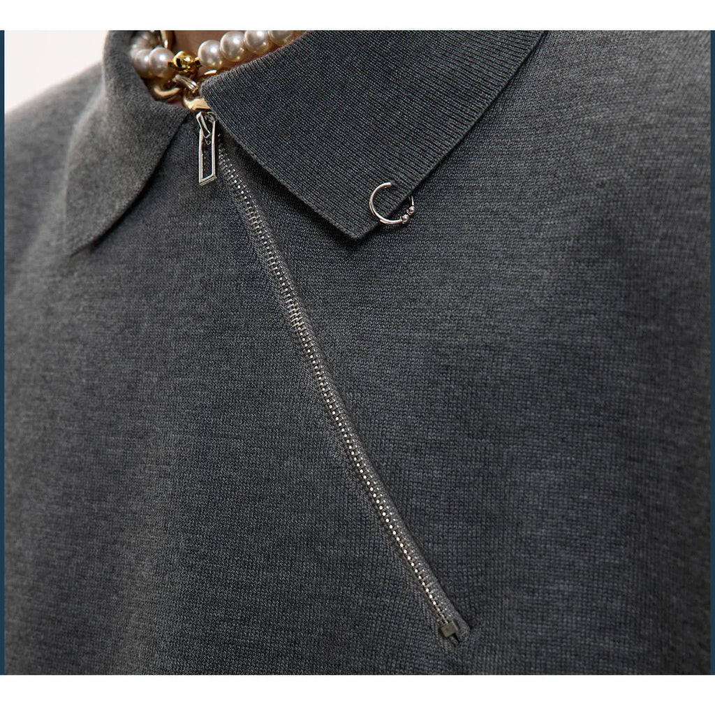 Men's black slim-fit knitted polo shirt with an oblique diagonal front zipper and lapel collar.