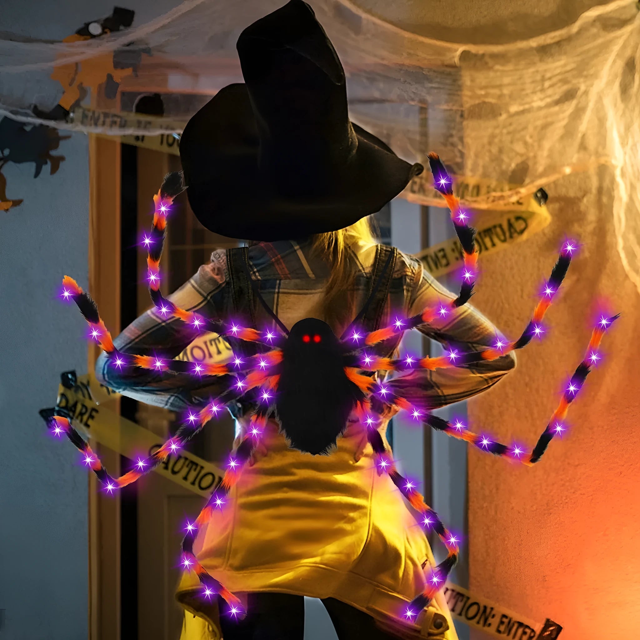 Halloween spider backpack with LED lights in plush sugar bag material showing colour variations