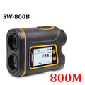 Handheld golf rangefinder device showing compact black housing with display screen and measurement lens