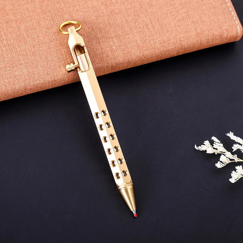 Brass hexagonal retro bolt pen with a 0.5mm tip shown next to a refill.