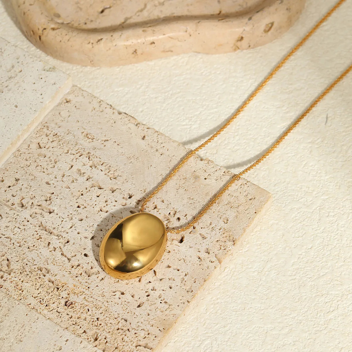 Gold geometric pendant necklace with adjustable 41-50cm chain on stainless steel with 18K gold-plating