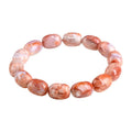 Natural cherry agate bracelet with barrel-shaped beads and Ruyi design element