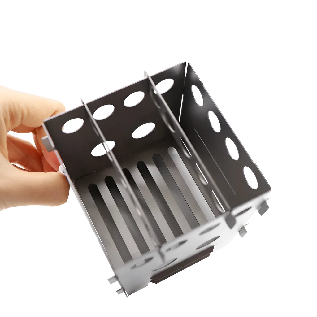 Grey pure titanium alloy multi-fuel camping stove with one-piece construction outdoors