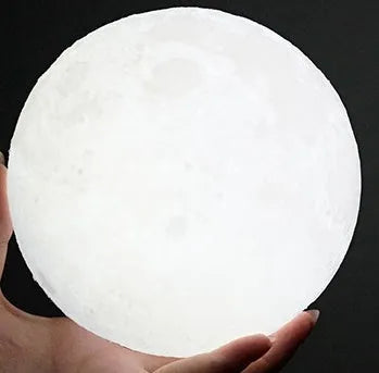 3D printed moon lamp with touch metal ring control on wooden stand, showing white and yellow light settings