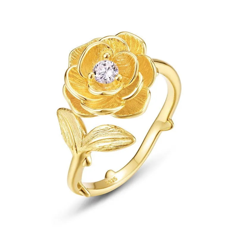 Women's 925 silver adjustable flower ring with gold electroplated finish on index finger