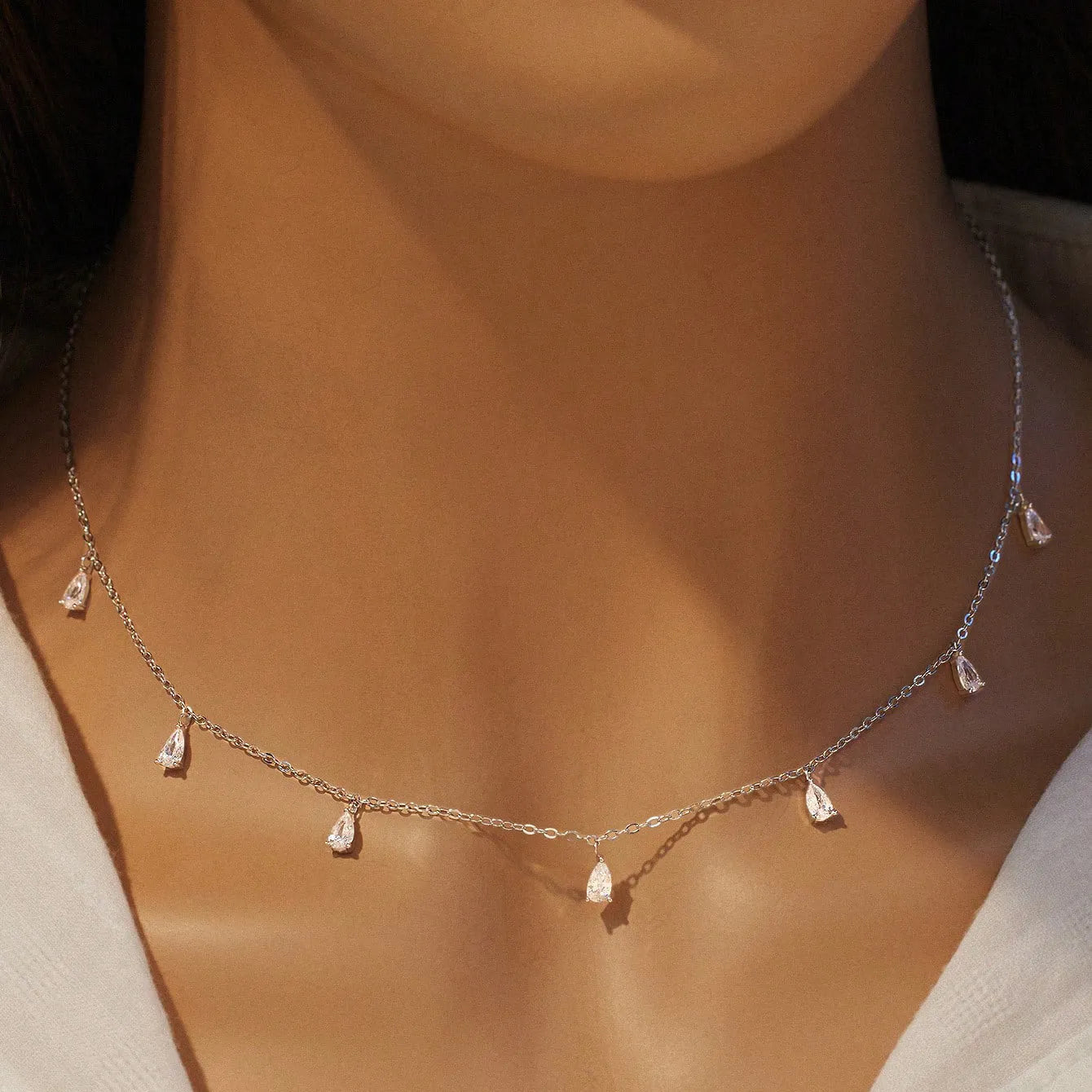Gentle drop-shaped artificial zircon necklace on an adjustable O-chain in 925 silver, shown in silver finish.