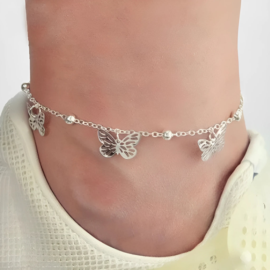 Alloy butterfly anklet for women in gold finish on ankle, hollow design beach foot ornament
