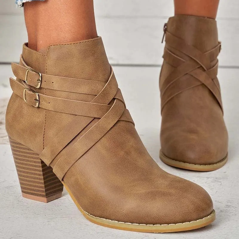 Women's black PU leather ankle boot with side zipper and 7cm heel on a rubber sole