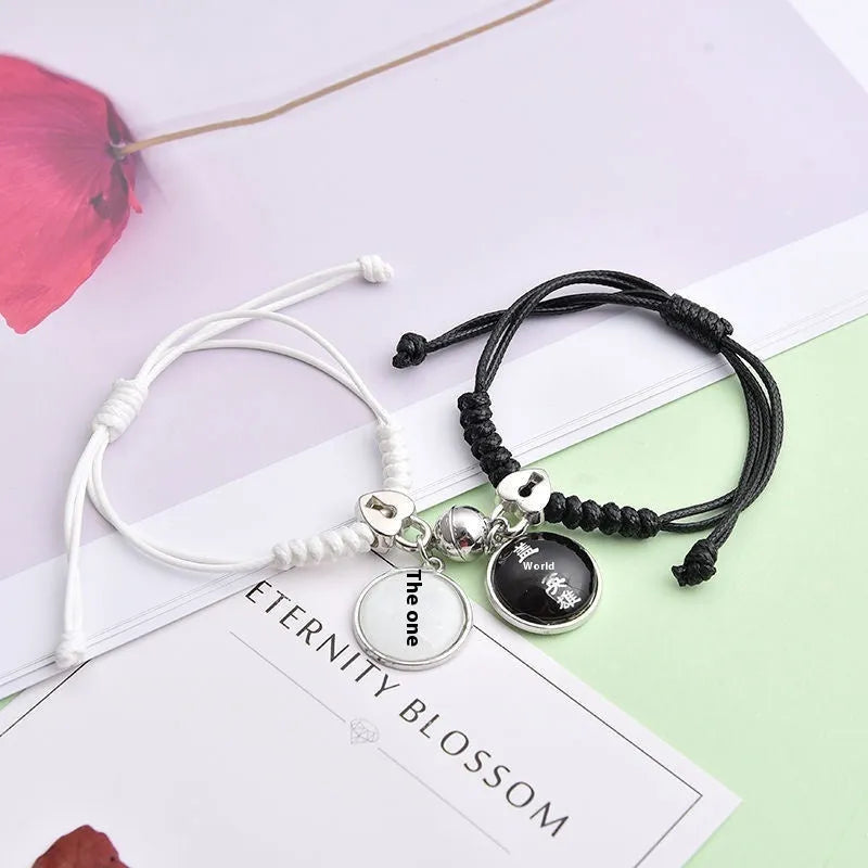 Alloy magnetic suction bracelet pair for couples with symbolic design options