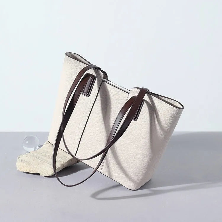 Genuine leather women's commuter shoulder bag with box-shaped design and urban simplicity styling