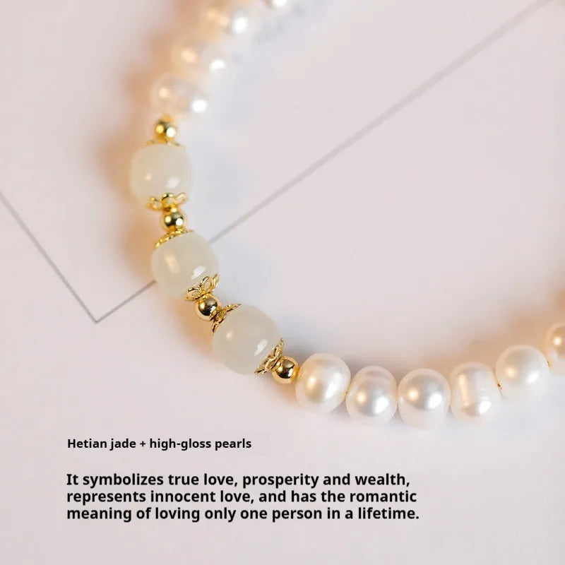 Korean style bracelet with diamond-shaped freshwater pearls in Hetian jade colour on a wrist.