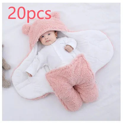 Baby quilted sleeping bag wrapper in a light blue colour showing its quilted pattern and size.