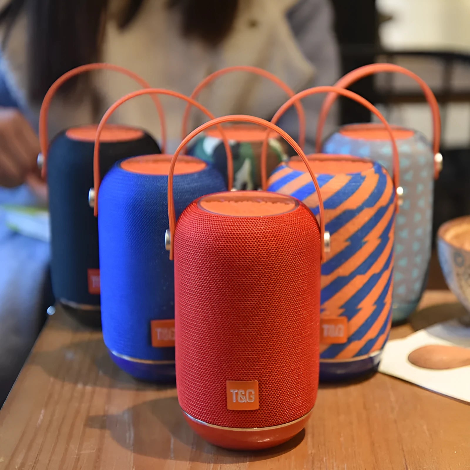 TG107 fabric wireless Bluetooth portable speaker in blue orange pattern, 99mm size, 10W output