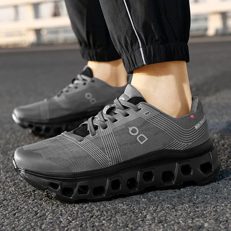 Men's casual running shoes with breathable mesh upper, low-top lace-up design, available in black