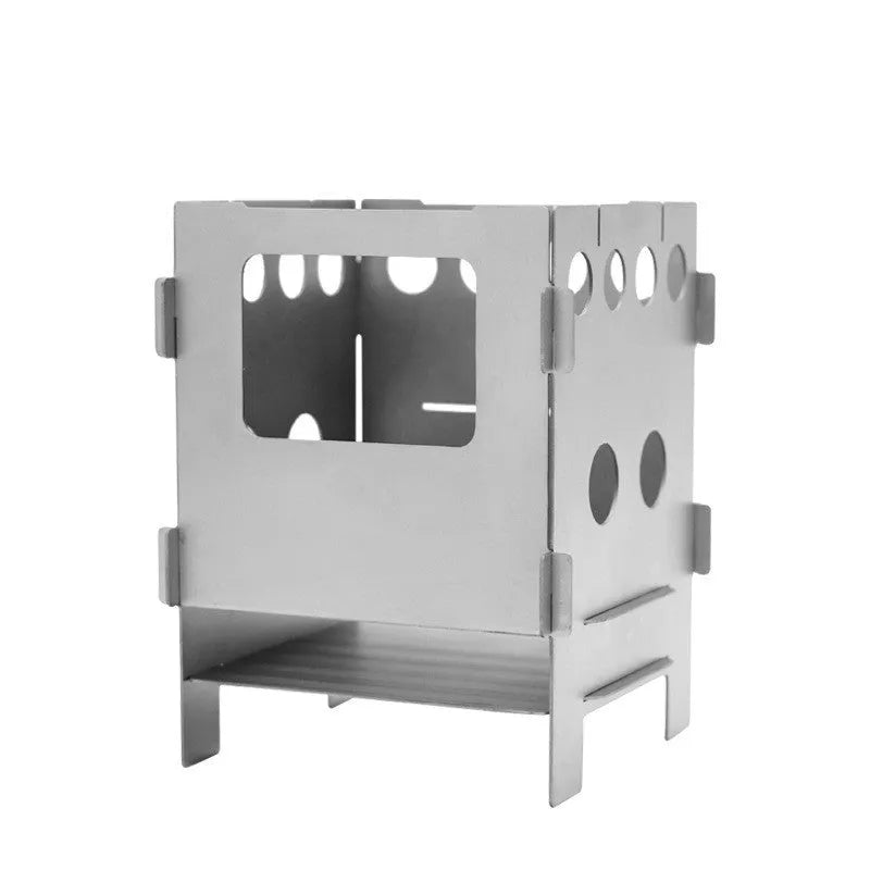 Grey pure titanium alloy multi-fuel camping stove with one-piece construction outdoors