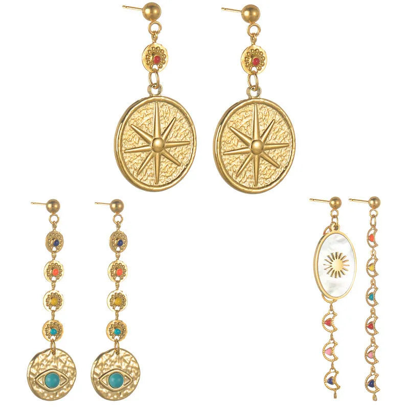 Stainless steel geometric drop earrings in Eight Awn Star, Eye, and Shell Sun designs.