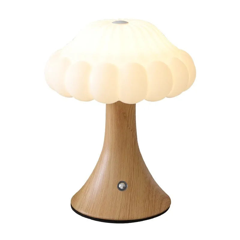 Wood grain finish mushroom-shaped touch night lamp on a table