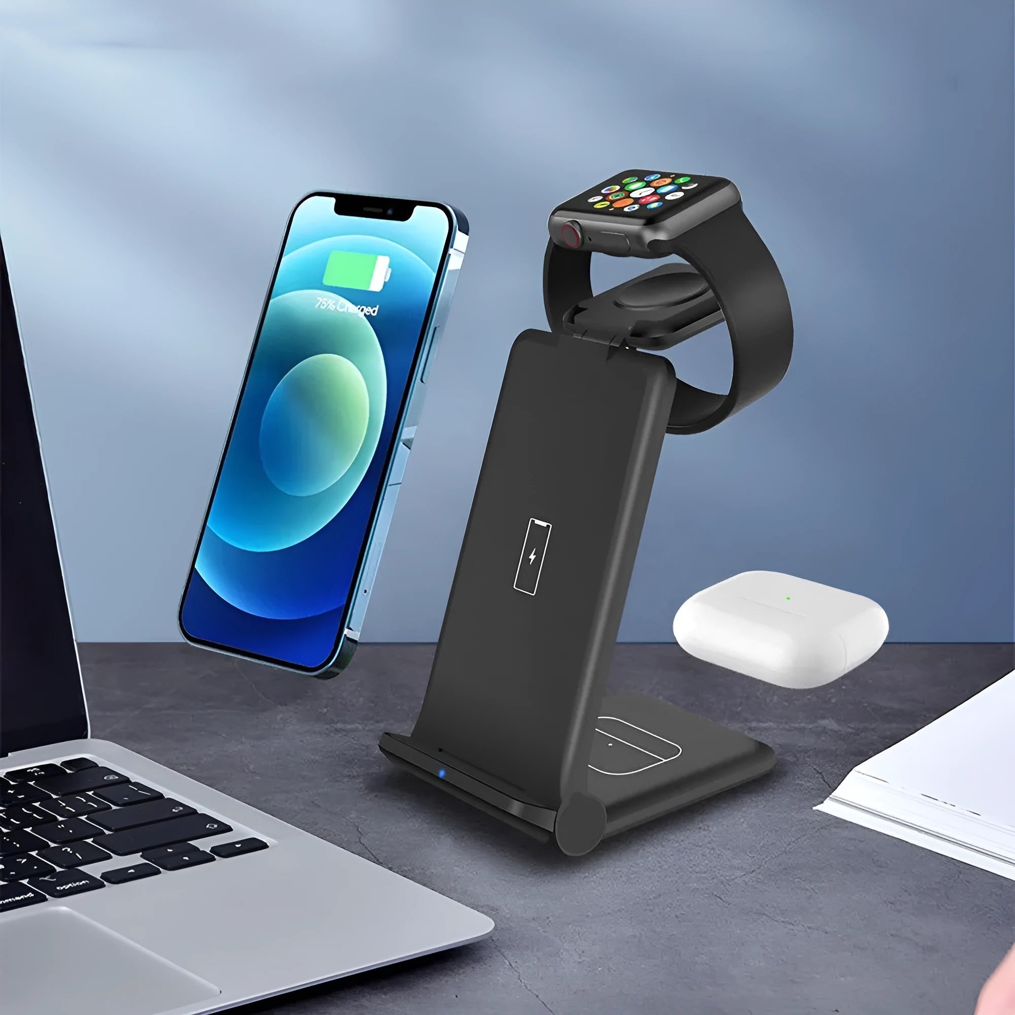 White 3-in-1 foldable wireless charging station for phone, Apple Watch, and AirPods on a desk.
