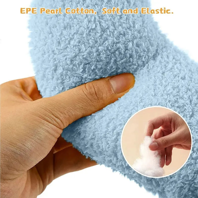 Small blue U-shaped pet pillow with faux fur, showing raised rim and half-donut shape for cats or small dogs.