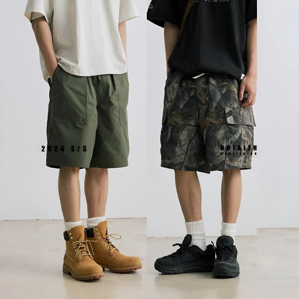 Loose straight-leg casual denim shorts in black or army green with a mid waist and zip fly.