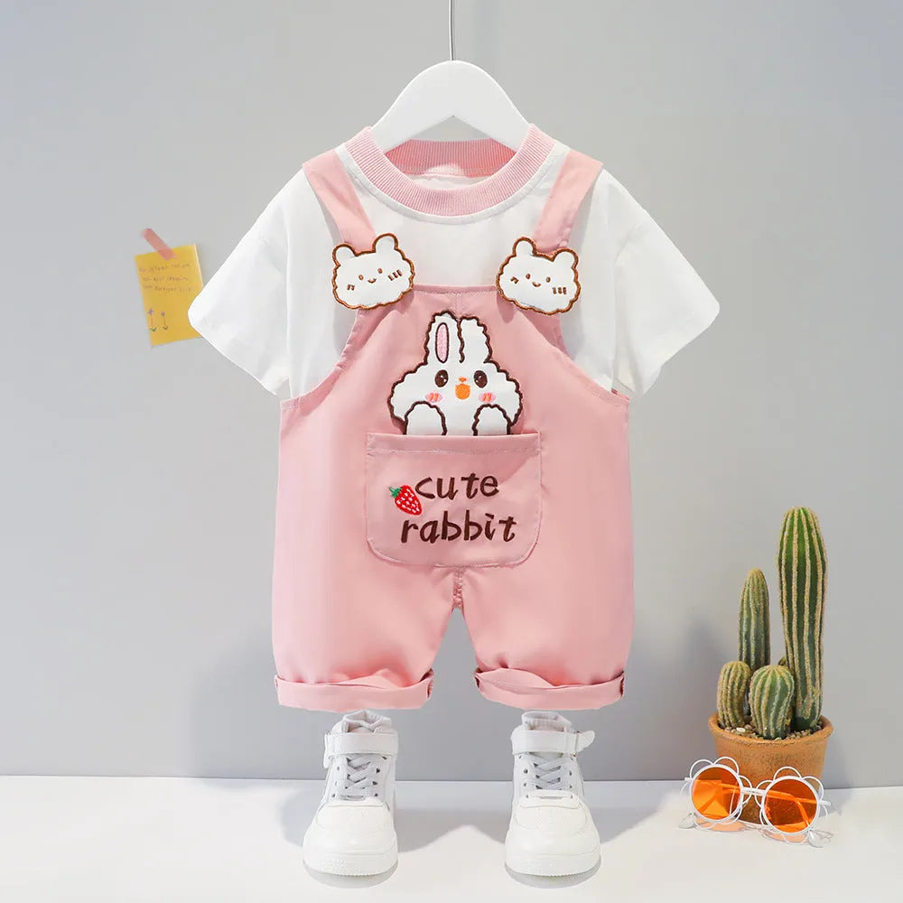 Yellow cotton baby cartoon short-sleeved overalls with strap design on a hanger