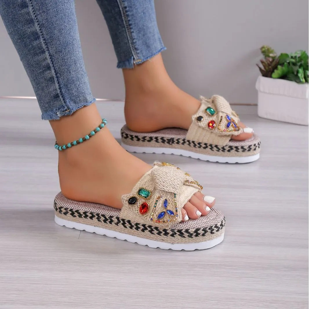 Women's beige platform sandals with bow detail, round toe and cloth upper, side view