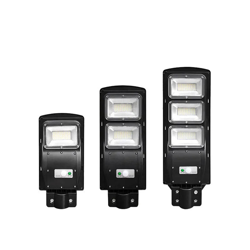 Integrated solar street light with LED panel and remote control for outdoor use.